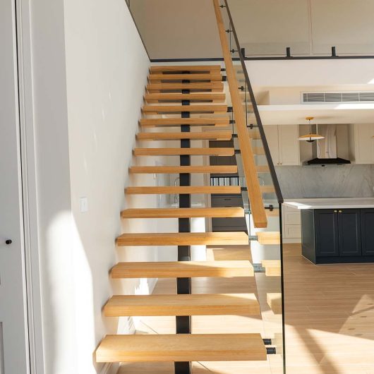 Steel Spine Stair Blackbutt Timber treads Blackbutt Handrails Glass Balustrade